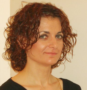 Portrait photograph of the tutor Dr Eva Kalpadaki