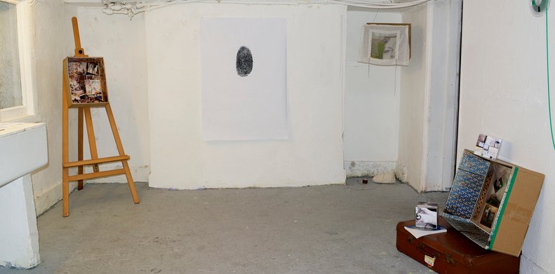 View of a photographic exhibition at the former Grey Area, with an alternative presentation of photographs in boxes during the Brighton Photo Fringe 2014. Photo by Eva Kalpadaki.